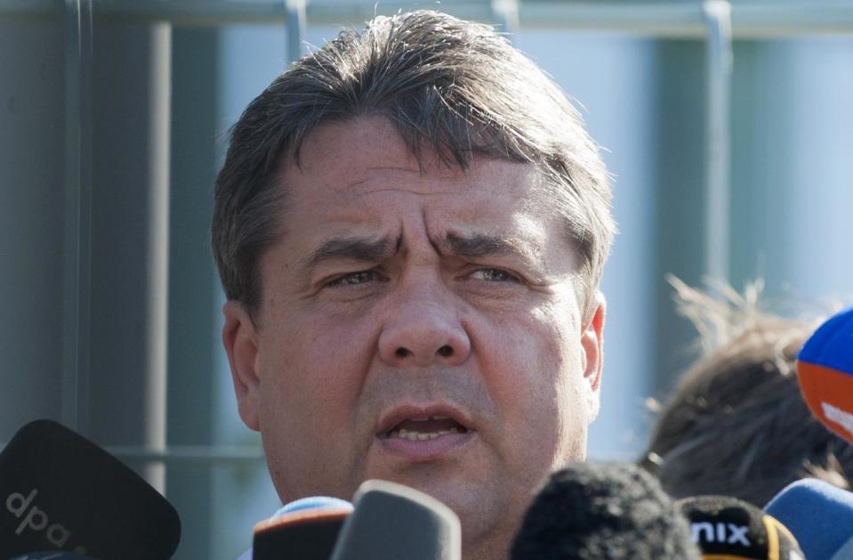 Chairman of Social Democratic Party SPD, Sigmar Gabriel gives a statement after a meeting of him and other opposition leaders with Chancellor Angela Merkel in Berlin, Thursday May 24, 2012. Germany's opposition leader says Chancellor Angela Merkel has accepted the need to add a separate set of measures promoting growth to the European Union's treaty enshrining fiscal discipline. Merkel and top lawmakers held a meeting Thursday. Sigmar Gabriel told reporters that she and the government "have moved to accept a pact for growth and investment." Merkel's center-right government needs the support of opposition parties to secure a two-thirds majority in Parliament for the legislation to pass. (AP Photo/dapd/Andreas Prost)