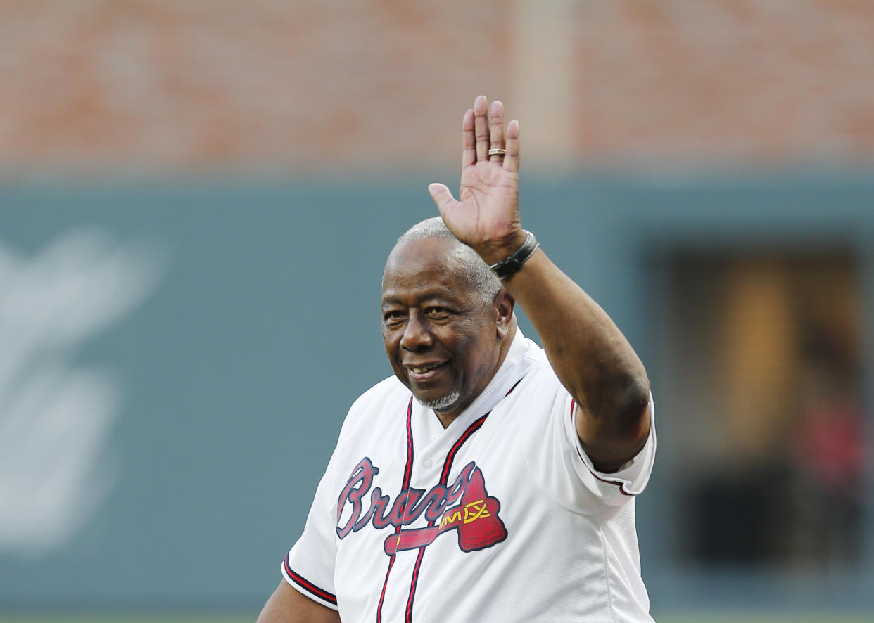 Hank Aaron believes Colin Kaepernick should be back in the NFL. (AP)