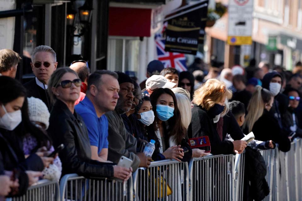 Small but growing crowd outside Windsor Castle for Prince Philip’s funeral on Saturday (AFP via Getty Images)