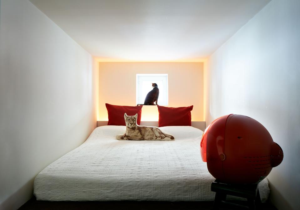 A former storage area was opened up during renovation, and Otero decided to make it a cozy guest bedroom that is comfortable for people—or a beloved cat—to stay for a couple of nights.