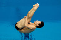 LONDON, ENGLAND - AUGUST 07: Kai Qin of China competes in the Men's 3m Springboard Diving Final on Day 11 of the London 2012 Olympic Games at the Aquatics Centre on August 7, 2012 in London, England. (Photo by Adam Pretty/Getty Images)