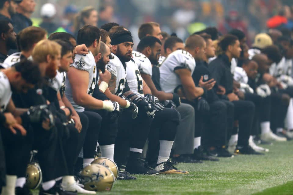 New Orleans Saints players kneel in protest ahead of a 2017 season game. Pic: Getty