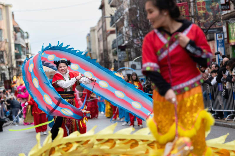 Dancers perform during the Chinese Lunar New Year 2024 celebration in the Usera neighbourhood of Madrid. Miguel Candela/SOPA Images via ZUMA Press Wire/dpa