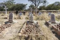 Gravestones in Luederitz in southern Namibia bear the names of German soldiers killed during the largely forgotten colonial war with the Herero and Nama tribes