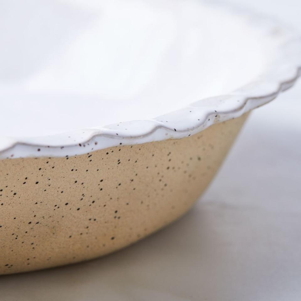 We're salivating just&nbsp;thinking about <a href="https://food52.com/shop/products/4096-speckled-ceramic-milk-pie-plate" target="_blank">how lovely a pumpkin pie would look</a> in this dish.