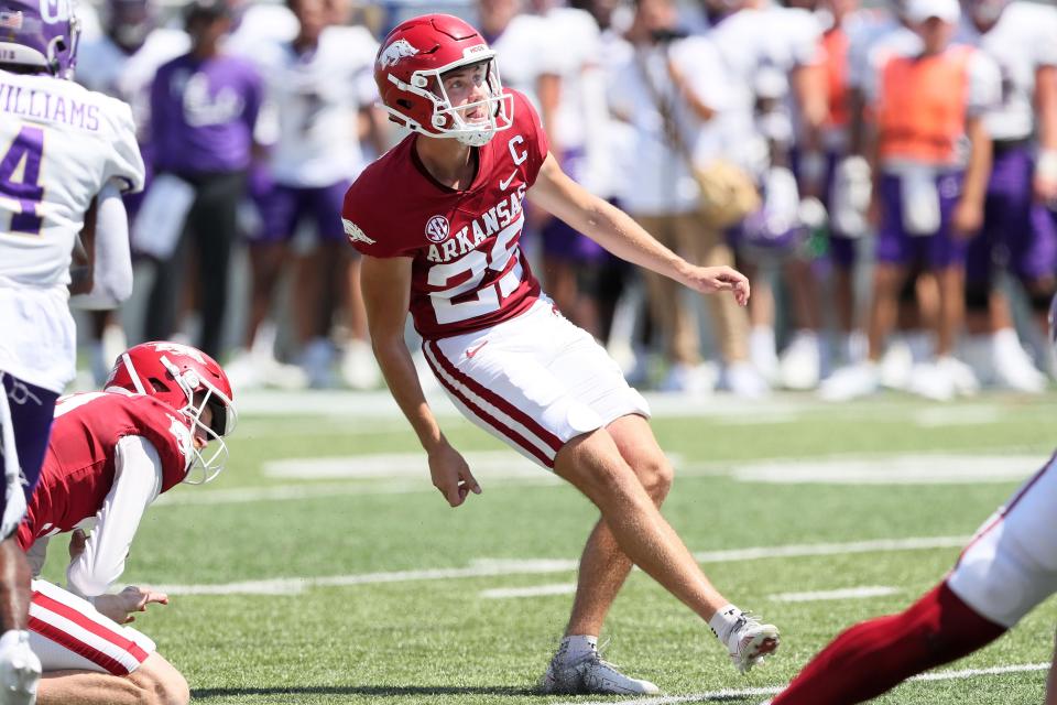 Sep 2, 2023; Little Rock, Arkansas, USA; Arkansas Razorbacks kicker Cam Little (28) kicks an extra point in the first quarter against the Western Carolina Catamounts at War Memorial Stadium. Mandatory Credit: Nelson Chenault-USA TODAY Sports