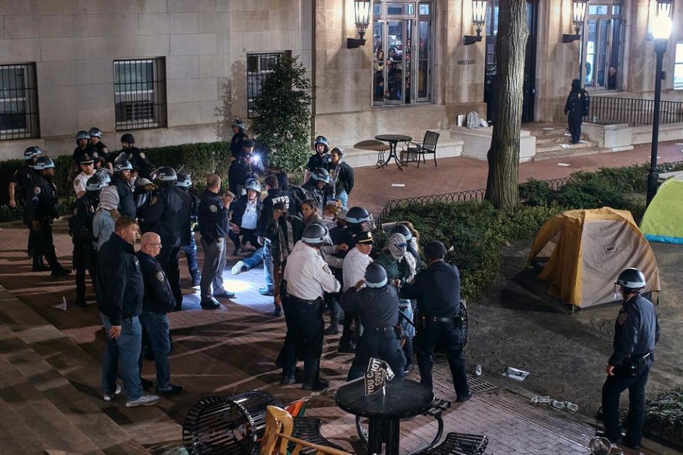 Police arrest protestors outside Hamilton Hall.<span class="copyright">Andres Kudacki for TIME</span>