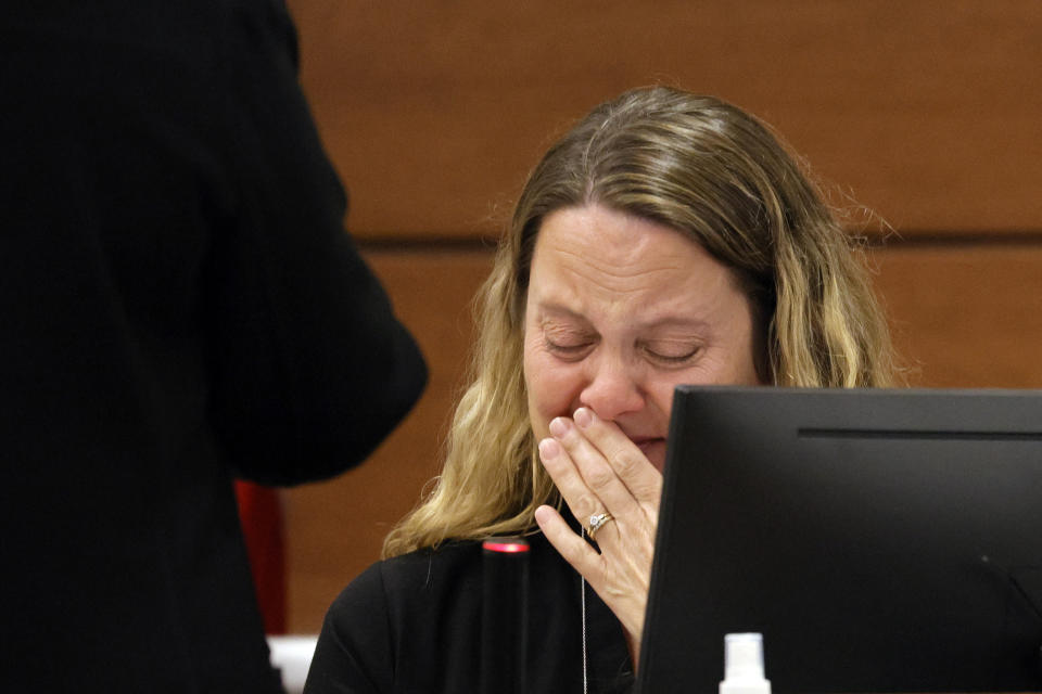 Kelly Petty breaks down as she is asked to identify her daughter in a photograph (not shown) before giving her victim impact statement during the penalty phase of Marjory Stoneman Douglas High School shooter Nikolas Cruz's trial at the Broward County Courthouse in Fort Lauderdale, Fla., Monday, Aug. 1, 2022. Petty's daughter, Alaina, was killed in the 2018 shootings. Cruz previously plead guilty to all 17 counts of premeditated murder and 17 counts of attempted murder in the 2018 shootings. (Amy Beth Bennett/South Florida Sun Sentinel via AP, Pool)