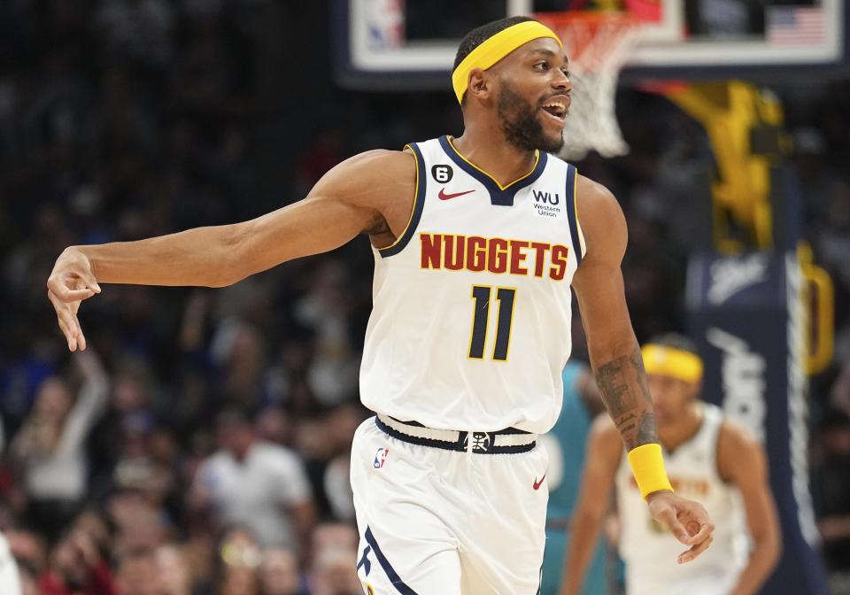 Nuggets forward Bruce Brown celebrates a 3-point basket against the Pistons during the second quarter on Tuesday, Nov. 22, 2022, in Denver.
