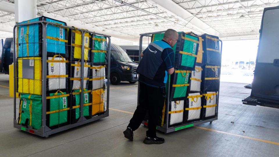 An third-party driver picks up packages for his delivery route. Amazon contracts with four providers for their delivery drivers. Sarah A. Miller/smiller@idahostatesman.com