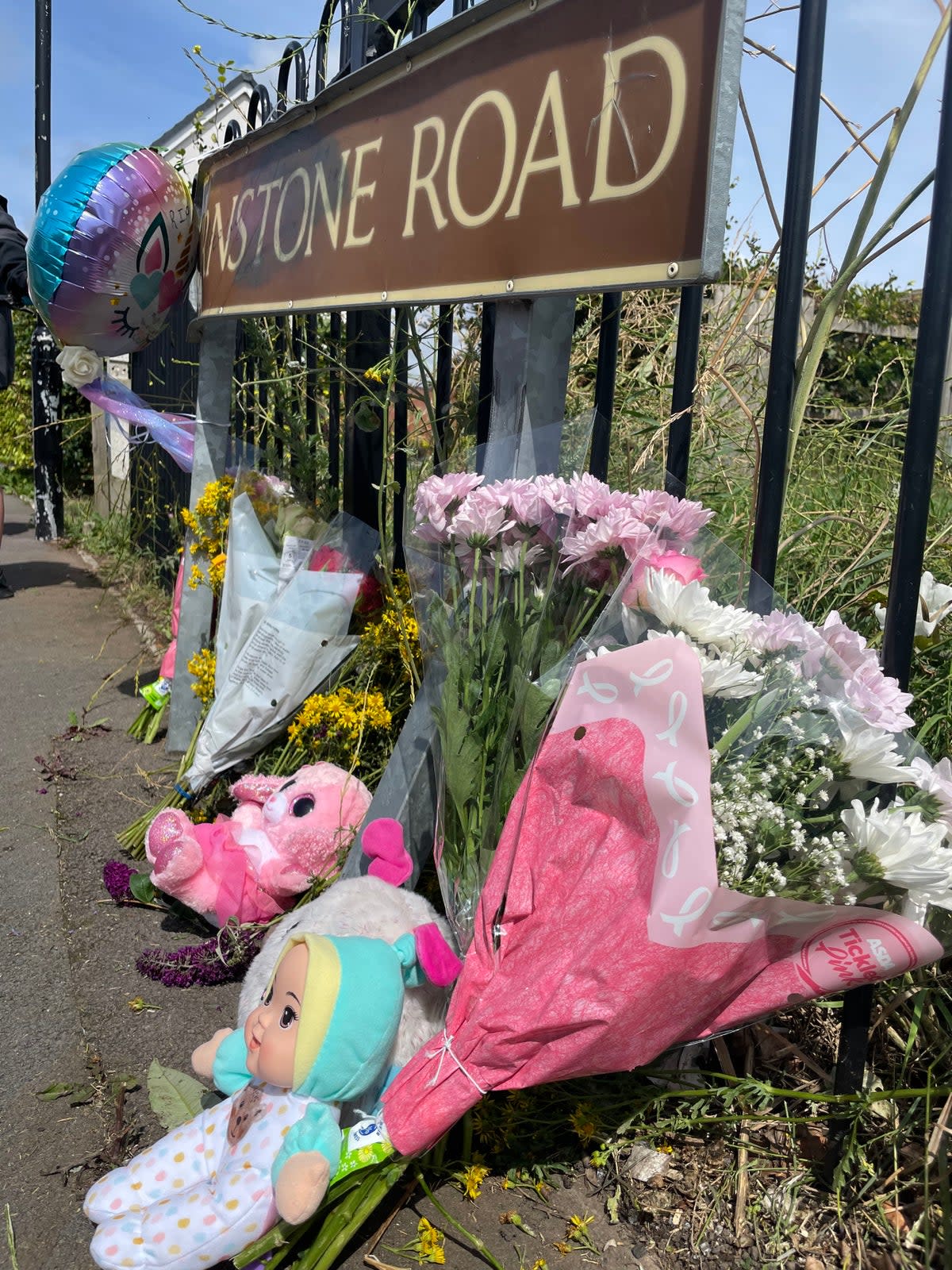 Flowers are left on Turnstone Road in Blakenall (PA)