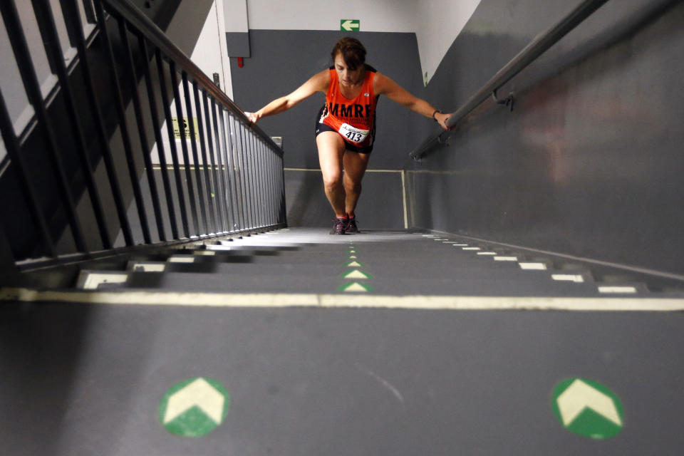 A competitor makes her way up during the Empire State Building Run-Up Wednesday, Feb. 5, 2014, in New York. (AP Photo/Jason DeCrow)