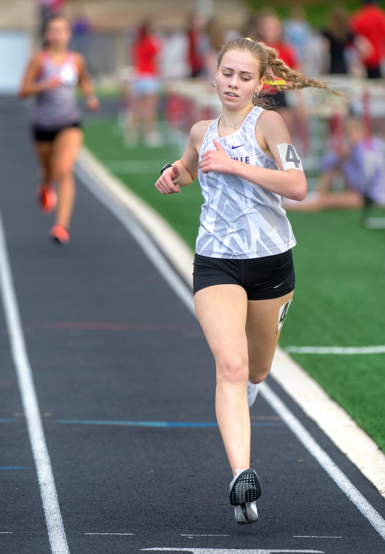 Williamsville's Louisa Wilson finishes in third place in the 3200-meter run during the girls Class 2A sectional track and field meet Wednesday, May 8, 2024 at Metamora High School.