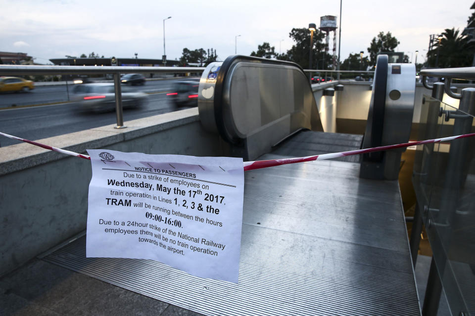 <p>Signs informing passengers about work stoppages hang from a cordon at a metro station in Athens, Greece, on Wednesday, May 17, 2017. Greeces economy returned to recession in the first quarter as delays in concluding talks between the government and its creditors raised the specter of another debt drama. (Yorgos Karahalis/Bloomberg via Getty Images) </p>