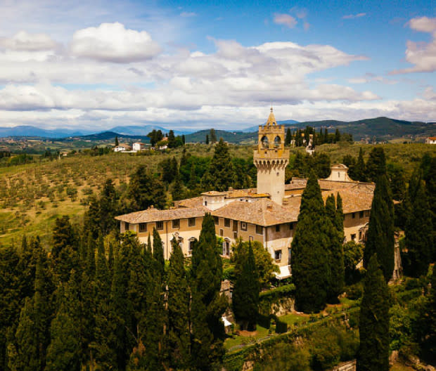 <p>Courtesy Image</p><p>Just a 30-minute drive from Florence, no one knows the actual origin of <a href="https://www.montegufoni.it/" rel="nofollow noopener" target="_blank" data-ylk="slk:Castello di Montegufoni;elm:context_link;itc:0;sec:content-canvas" class="link ">Castello di Montegufoni</a>. We do know, however, that the Florentine government razed the original castle to the ground in 1135. Montegufoni was rebuilt between 1280 and 1300 and occupied by the Acciaiolis, a famed steel-working family that founded a bank in the 13th century and built ties with the House of Medici. Its members set out to conquer Malta, Corinth, and Athens, where they reigned under the "Duke of Athens" title for over 100 years.</p><p>Visitors can choose among 29 unique apartments, or live the Italian dream in one of the 10 holiday homes right next to the castle. Each apartment and home are unique with some featuring incredible frescoes and others offering up to four bedrooms. One of the rooms features a fresco by Gino Severini called “La Sala delle Maschere.”</p><p>On-site, guests will find a garden, a pool, and Il Ristorantino, a restaurant offering traditional Tuscan meals featuring local products and natural ingredients. </p><p>Closest airport: Florence.</p><p><span>expedia.com</span></p>