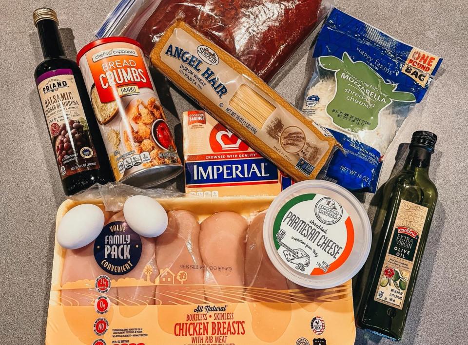 ingredients for ree drummond's chicken parmesan recipe on a kitchen counter
