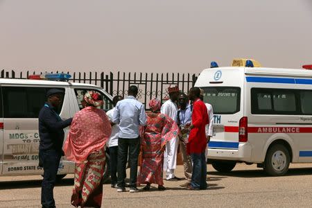 Ambulances carrying the bodies of three killed UN staff are seen at Maiduguri Airport, Nigeria March 2, 2018. REUTERS/Afolabi Sotunde