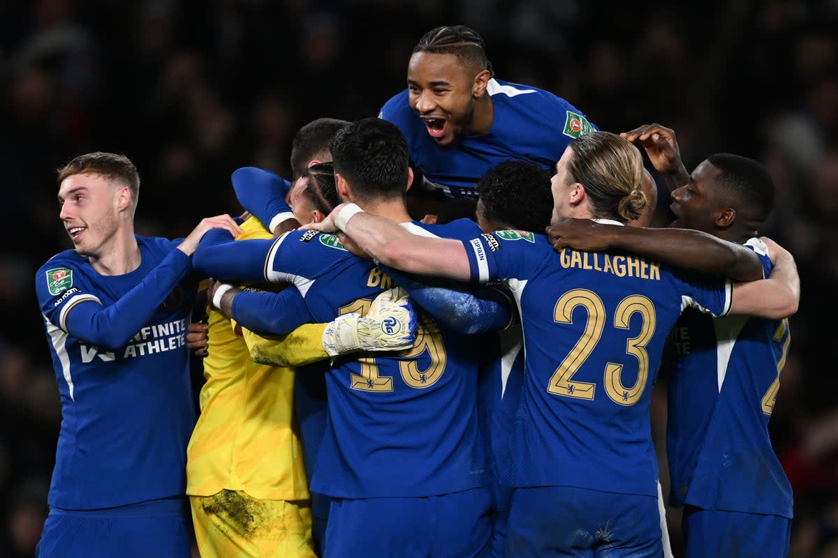 Chelsea celebrate a remarkable win  (Chelsea FC via Getty Images)