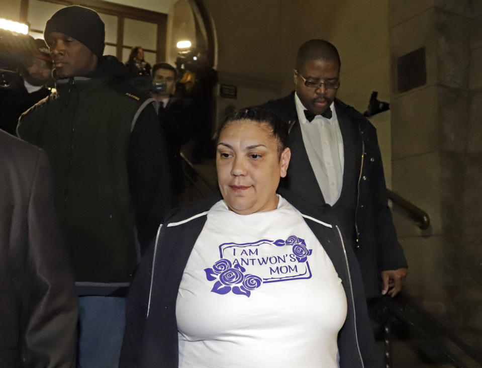 Michelle Kenney, center, the mother of Antwon Rose II, leaves the Allegheny County Courthouse with supporters after hearing the verdict of not guilty on all charges for Michael Rosfeld, a former police officer in East Pittsburgh, Pa., Friday, March 22, 2019. Rosfeld was charged with homicide in the fatal shooting of Antwon Rose II as he fled during a traffic stop on June 19, 2018. (AP Photo/Gene J. Puskar)