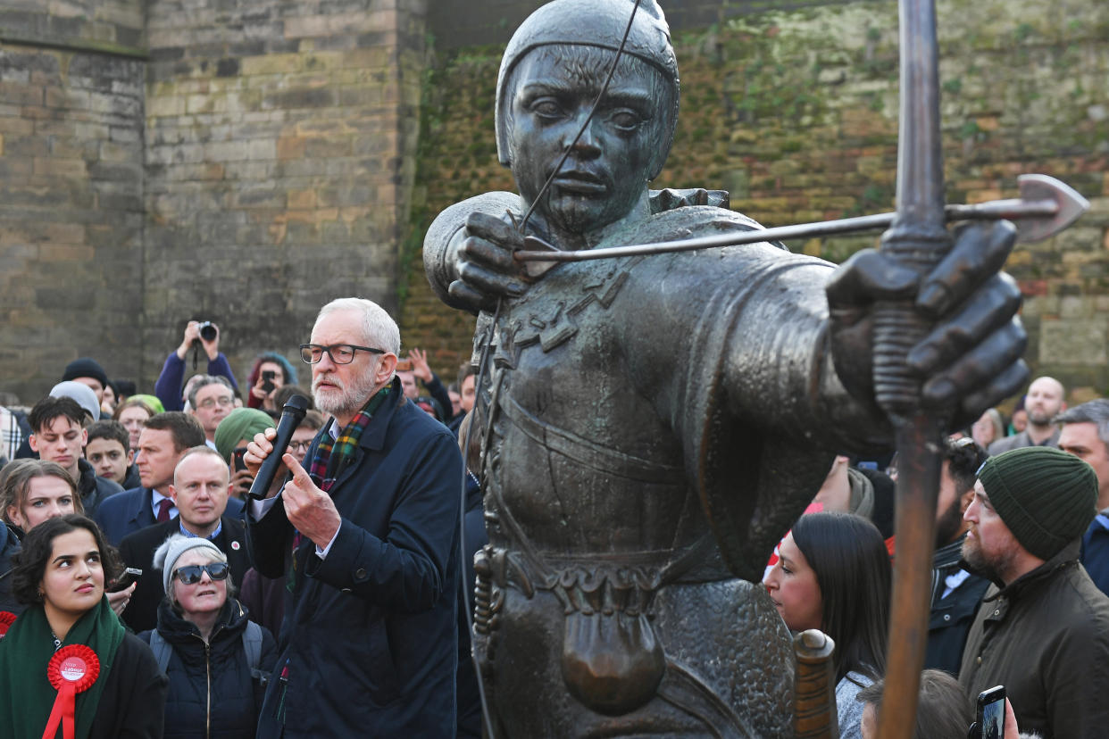 Labour leader Jeremy Corbyn speaks to a crowd of supporters next to a statue of Robin Hood in Nottingham, while on the General Election campaign trail.