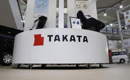 Displays of Takata Corp are pictured at a showroom for vehicles in Tokyo November 5, 2014. REUTERS/Toru Hanai