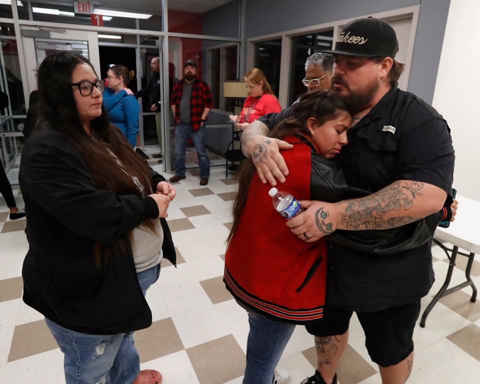 Slaton ISD mother Allie Shaw stands near daughter, freshman Jesselyne Garcia who is hugging Alex Garcia after talking to school board members. Slaton ISD board members heard from several parents and students regarding race-related issues at the beginning of their Board of Trustees meeting Thursday.