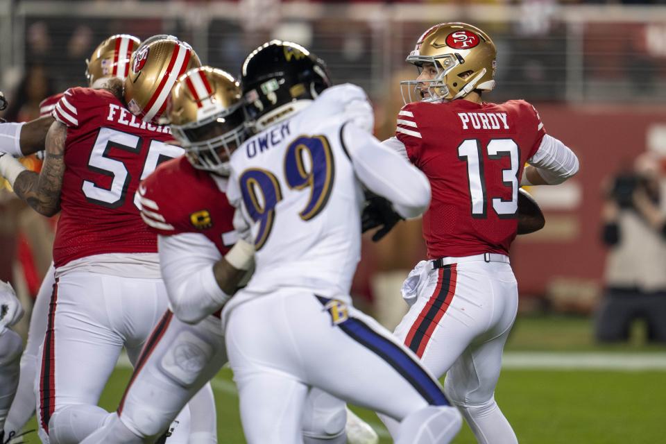 Dec 25, 2023; Santa Clara, California, USA; San Francisco 49ers quarterback Brock Purdy (13) prepares to pass the football against the Baltimore Ravens during the first quarter at Levi’s Stadium. Mandatory Credit: Neville E. Guard-USA TODAY Sports