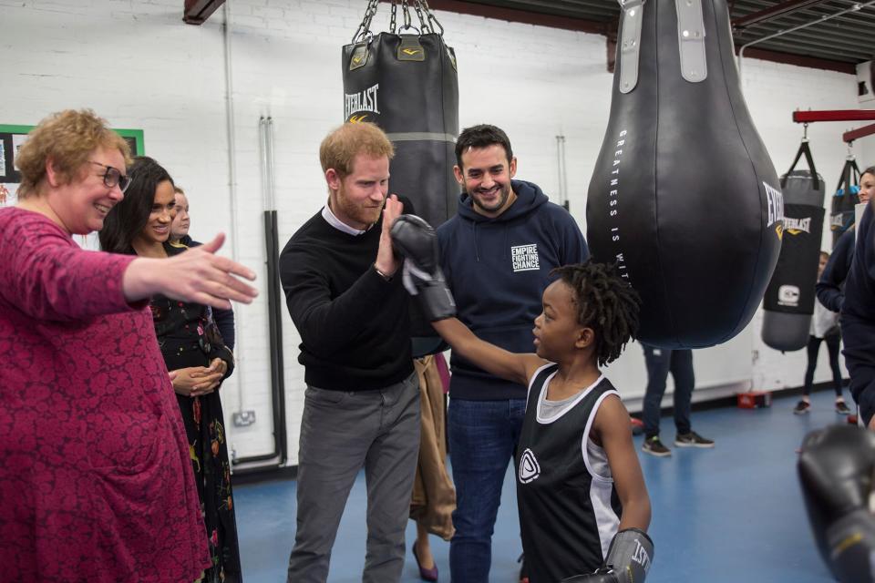 Prince Harry practiced his boxing technique with 7-year-old Aziah Selassie during a February visit to Empire Fighting Chance, a charity based in Bristol.