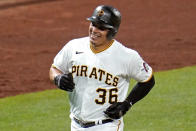 Pittsburgh Pirates' Jose Osuna rounds third after hitting a solo home run off St. Louis Cardinals starting pitcher Kwang-Hyun Kim during the third inning of a baseball game in Pittsburgh, Saturday, Sept. 19, 2020. (AP Photo/Gene J. Puskar)