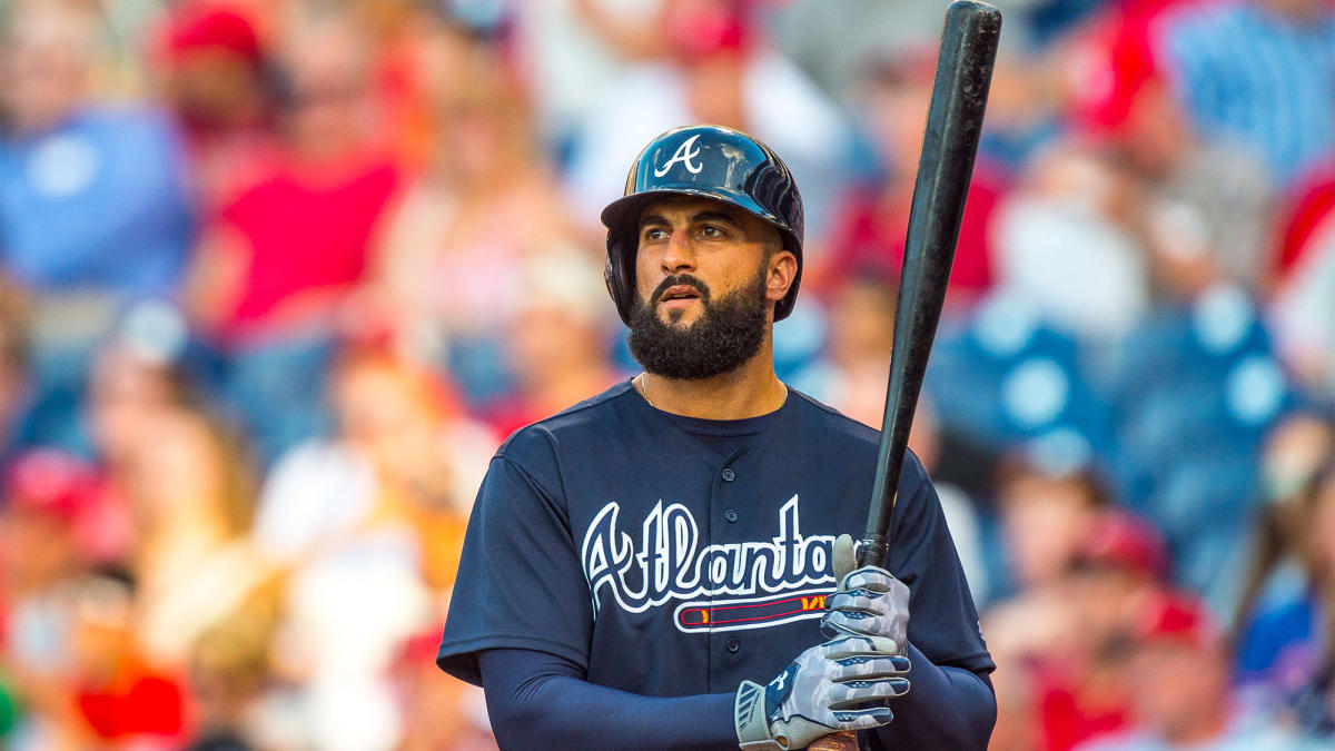 Nick Markakis with his wife and three sons