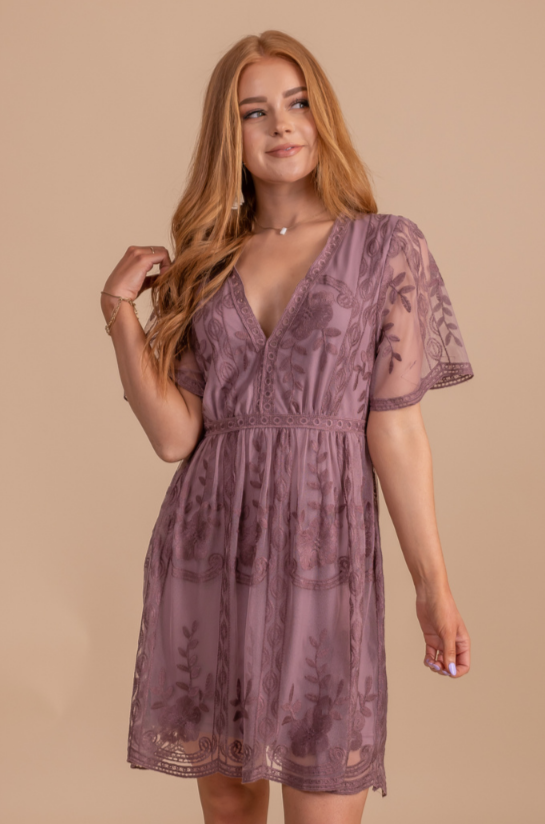 <p><a href="https://bellaellaboutique.com/products/light-my-fire-mauve-lace-mini-dress?currency=USD&variant=22117444124732&gclid=CjwKCAjwo_KXBhAaEiwA2RZ8hJNEBPpl25Nc7sRehOHuMziJajOGNy6ONGIcYmlPRTrGCRFG_BcgaxoClS4QAvD_BwE" rel="nofollow noopener" target="_blank" data-ylk="slk:Shop Now;elm:context_link;itc:0;sec:content-canvas" class="link ">Shop Now</a></p><p>Bella Ella Boutique Light My Fire Mauve Lace Mini Dress</p><p>$70.00</p><p>bellaellaboutique.com</p><span class="copyright">Bella Ella Boutique</span>