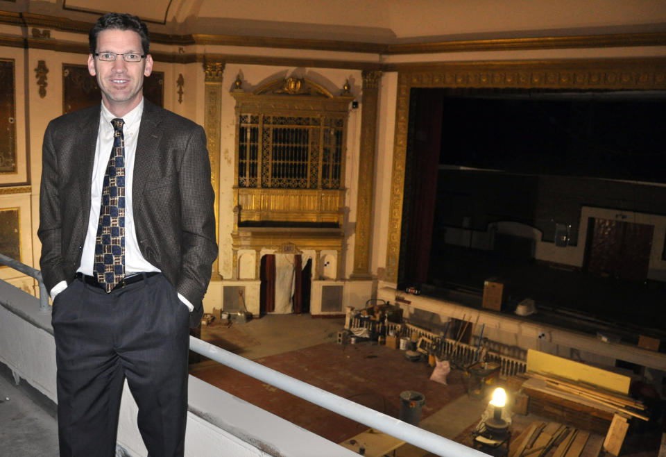 In this Nov. 17, 2012 photo Stephen Williamson, executive director of the State Theatre, shows the balcony view inside the historic downtown movie house under restoration in Sioux Falls, S.D. The circa-1926 theater, closed since 1991, has been raising funds for its eventual reopening and plans to begin showing movies again sometime in 2013. (AP Photo/Dirk Lammers)