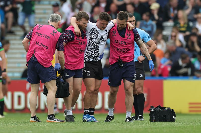 Callum Sheedy of Bristol Bears is helped off the pitch -Credit:Getty Images