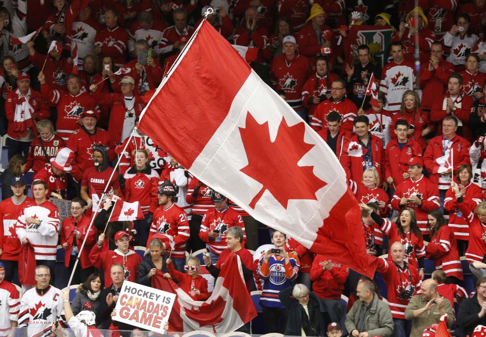 Canadian supporters cheer after Canada defeated the United States in their IIHF World Junior Championship ice hockey game in Malmo