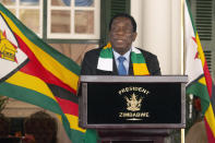 Zimbabwean President Emmerson Mnangagwa addresses a press conference at State House in Harare, Sunday, Aug. 27 2023. Authorities in Zimbabwe say President Emmerson Mnangagwa has been re-elected for a second and final term. The Zimbabwe Election Commission announced late Saturday that Mnangagwa won 52.6% of the votes in the midweek election. (AP Photo/Tsvangirayi Mukwazhi)
