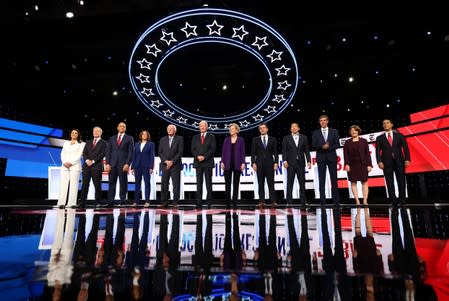 Democratic presidential candidates pose before the fourth Democratic 2020 U.S. presidential debate in Ohio