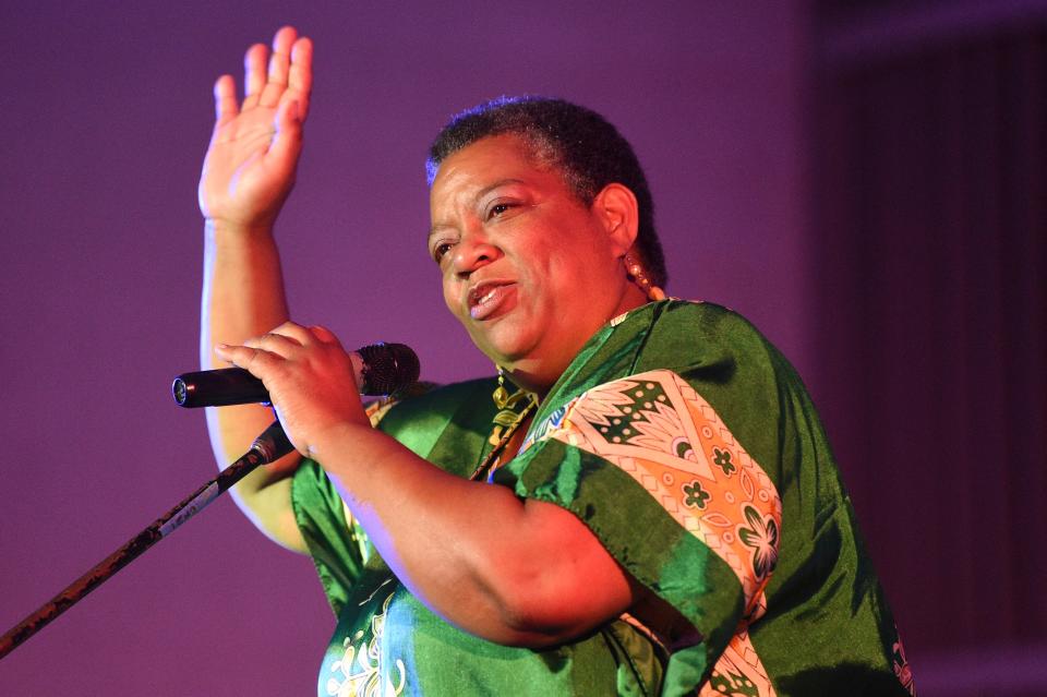 Sheila Arnold takes the stage at Flatwater Tales held in the Historic Grove Theater in Oak Ridge, Friday, June 3, 2022.