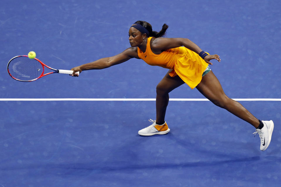 Sloane Stephens, of the United States, reaches for a shot from Elise Mertens, of Belgium, during the fourth round of the U.S. Open tennis tournament Sunday, Sept. 2, 2018, in New York. (AP Photo/Adam Hunger)