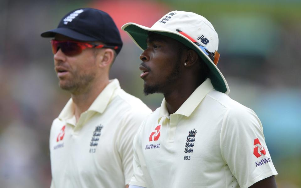 England bowlers James Anderson and Jofra Archer leave the field during Day Three of the First Test match between England and South Africa at SuperSport Park on December 28, 2019 in Pretoria, South Africa.  - GETTY IMAGES