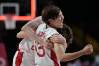 Japan's Saki Hayashi, left, and Japan's Rui Machida, right, celebrate the team's win over Belgium in a women's basketball quarterfinal game at the 2020 Summer Olympics, Wednesday, Aug. 4, 2021, in Saitama, Japan. (AP Photo/Eric Gay)