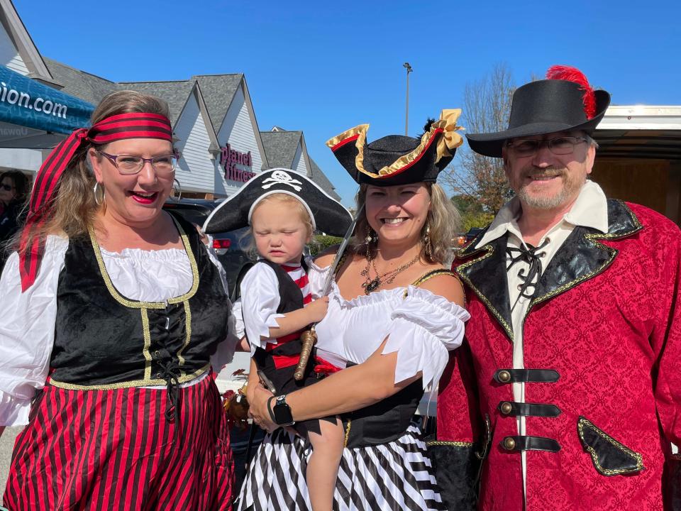 Tami Bradford, Roselyn Bradley, 2, Jessica Bradley, and David Bradford are ready for the costume contest at the third annual Farragut Harvest Festival at Village Green Shopping Center, Oct. 22, 2023.
