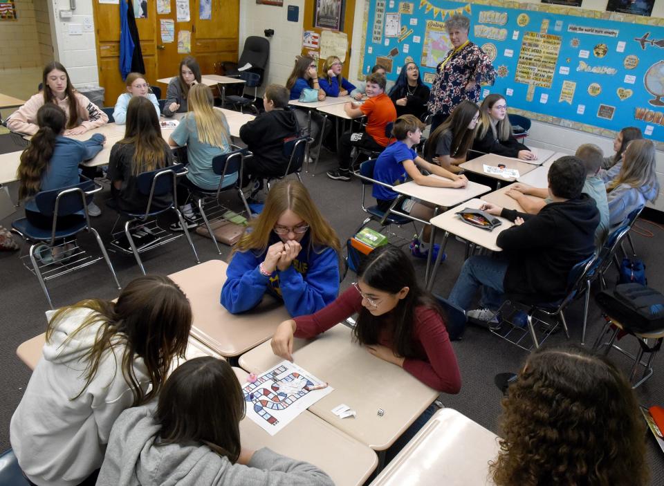 Seventh graders at Jefferson Middle School play the history game they created about ancient Hebrew history