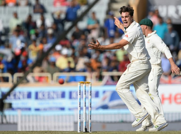 Australian bowler Pat Cummins celebrates after he dismissed Indian batsman Ravichandran Ashwin during the third day of the third Test in Ranchi, on March 18, 2017
