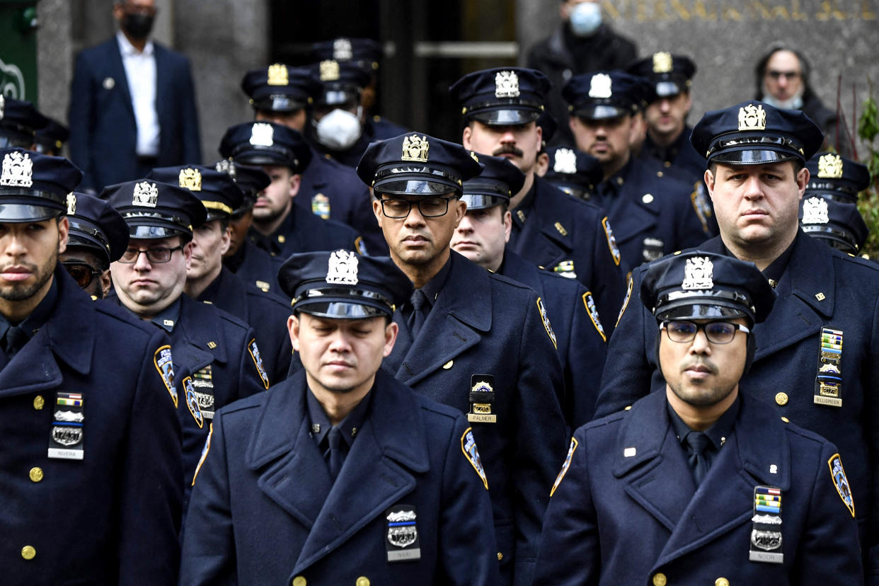 Image: New York police officers gather for the funeral of officer Wilbert Mora on Feb. 2, 2022, in New York. (Angela Weiss / AFP - Getty Images)
