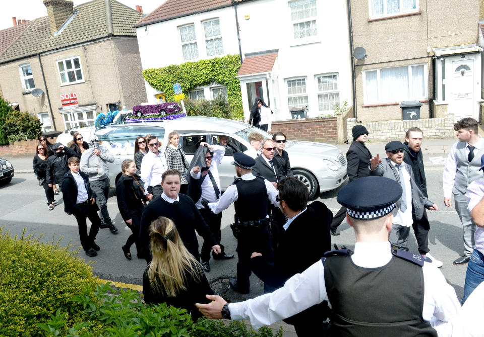 Ugly scenes were witnessed as mourners at Henry Vincent’s funeral clashed with the press