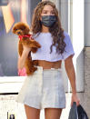 <p>Olivia Culpo totes her cute pooch while shopping in Beverly Hills on Thursday.</p>