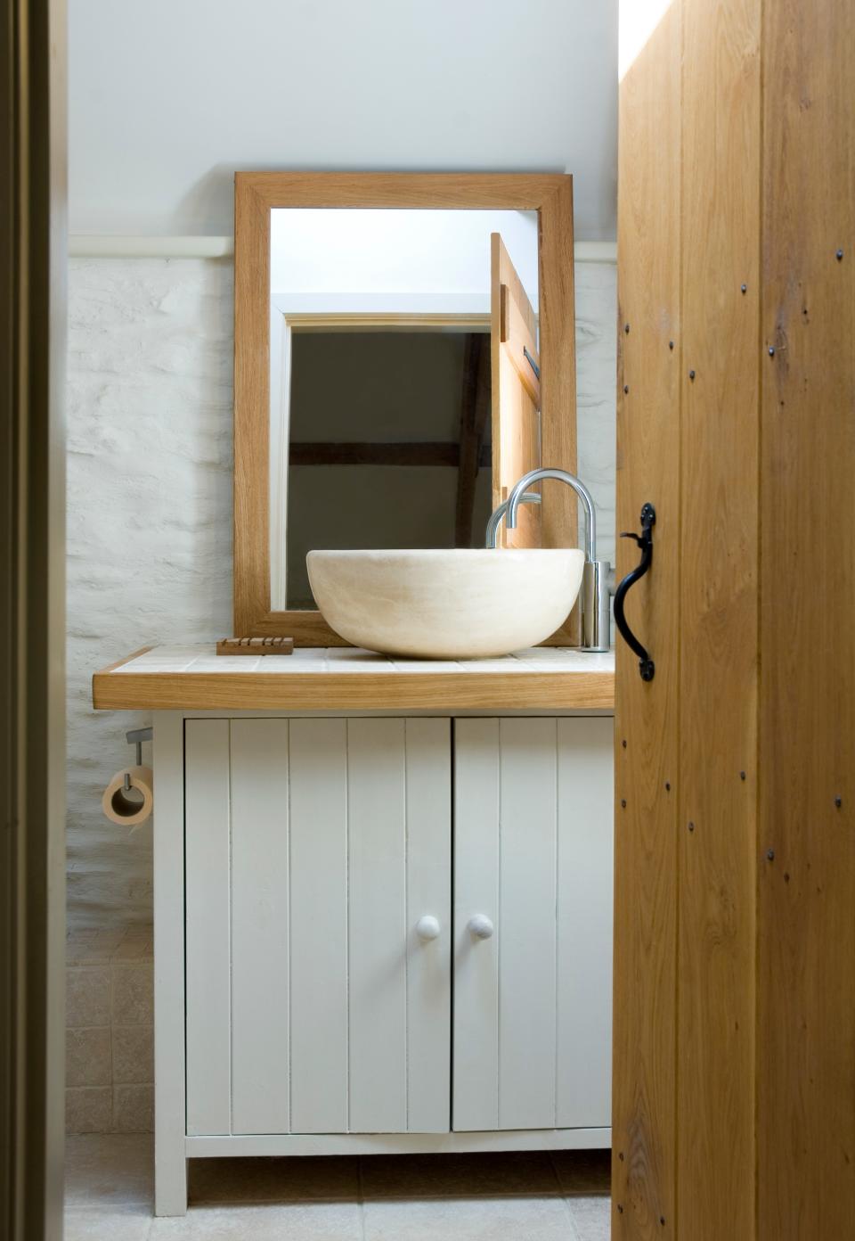 A bathroom vanity has a one-of-a-kind vibe when DIY is involved.