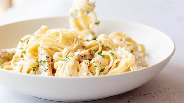 Chicken fettuccine Alfredo in bowl 