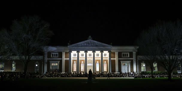 PHOTO: Members of the University of Virginia community attend a candlelight vigil on the South Lawn for the victims of a shooting overnight at the university, on Nov. 14, 2022 in Charlottesville, Va. (Win Mcnamee/Getty Images)