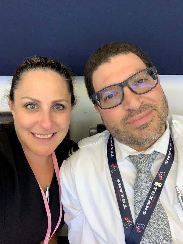 Jessica and Rene Trujillo pose before a United Airlines flight to Houston in San Francisco